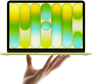 MacBook Neo color amarillo cítrico, sostenida en equilibrio en la punta de los dedos de una mano abierta, la pantalla muestra un patrón abstracto y colorido