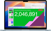 Pantalla de una MacBook que muestra una presentación en Keynote y la ventana de configuración de FileVault en el fondo
